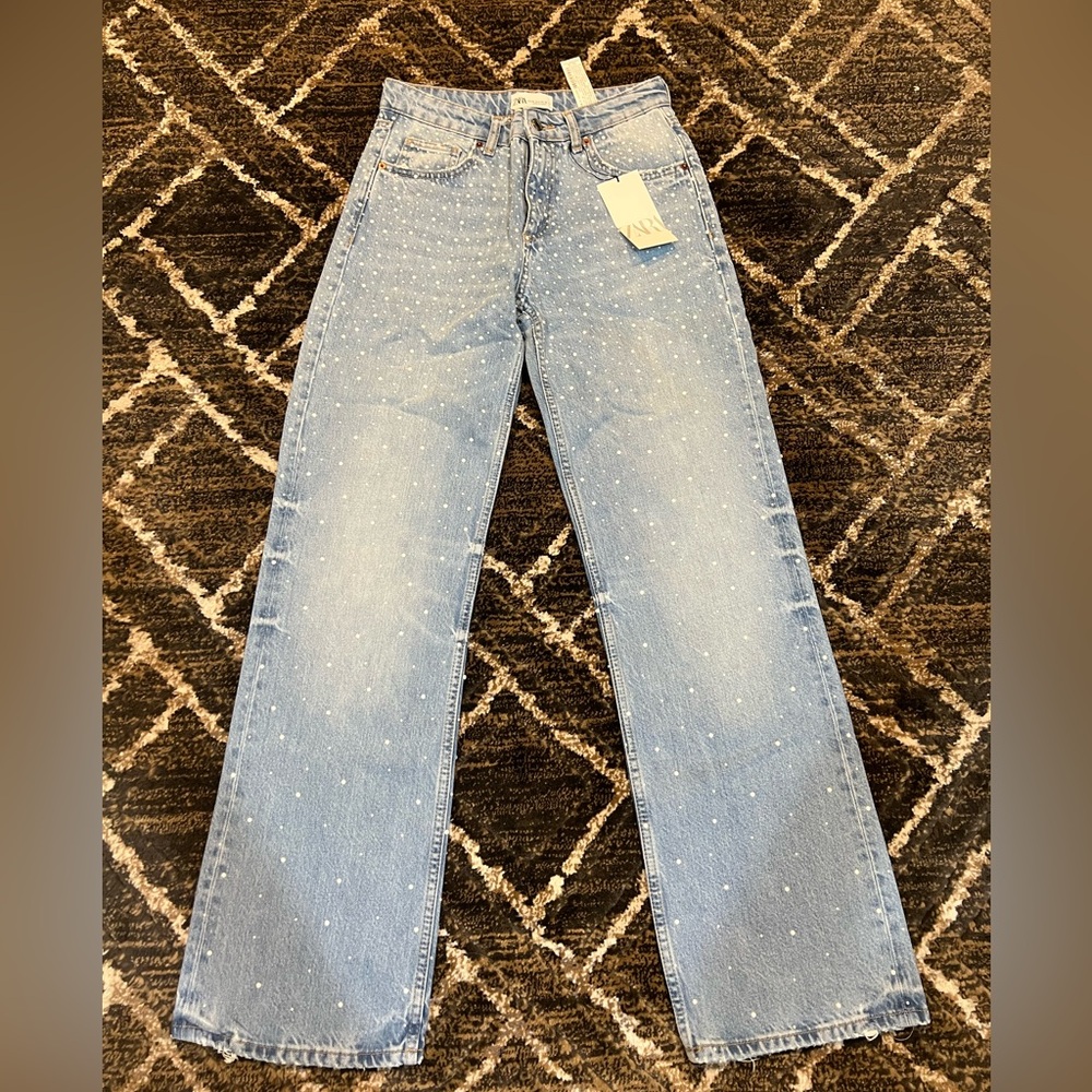 Women's ZARA Light Blue Jeans with White pearl embellishments.
